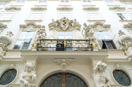 Austria, Vienna,  the facade of a traditional palace with statues in the old townのeditorial素材