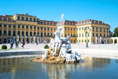 Vienna, Austria - August 7, 2016:  The main facade of the Schonbrunn Palace with a fountain in the foregroundのeditorial素材