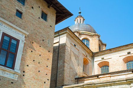 Urbino, Italy - March 20, 2015: The Cathedral dome with the Palace in the left foregroundのeditorial素材
