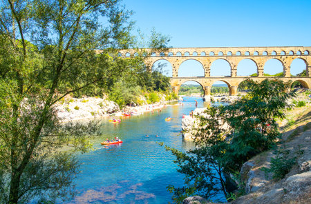 Nimes, France - August 26, 2016:  Local people near the Ponr Du Gard, ancient Roman aqueduct on the Gardon riverのeditorial素材