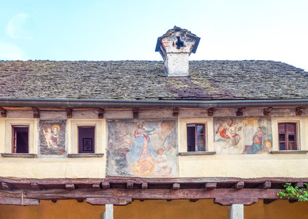 Orta San Giulio, Italy - August 18, 2013: The frescoes of the medieval Casa Dei Naniのeditorial素材