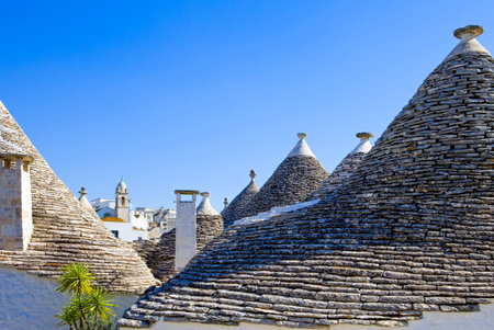 Alberobello, Italy, detail of the conical roof of the  Trulli, rural dwellings of medieval origin made with dry stonesの写真素材