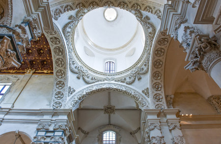 Lecce,  Italy - April 17, 2010: Paintings and Baroque decorations in the Santa Croce Basilica insideのeditorial素材