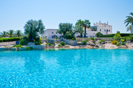 Fasano, Italy - july 22, 2006: The  pool of the S.Domenico resort, one of the ancient rural farms of the territory, transformed into luxurious resortsのeditorial素材
