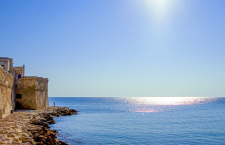 Monopoli, Italy - Juky 21, 2006: View of the ramparts of the old town over the seaのeditorial素材