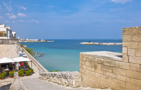 Otranto, Italy - April 11, 2010: A resturant on the ramparts over the great harborのeditorial素材