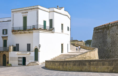 Otranto, Italy - April 11, 2010: Houses of the old town at the side of the Aragonese castleのeditorial素材