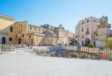Matera, Italy - May 3, 2017:   The churchs of V. Veneto square with the Hypogeum ruins in the foregroundのeditorial素材