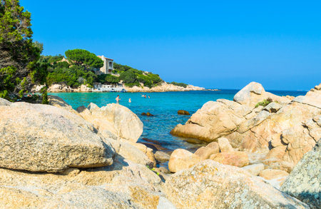 Cala di Volpe, Italy - September 10, 2012: Sardinia island, tourists bathing in the bayのeditorial素材