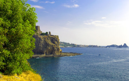 Sicily, Acicastello, view of the sea with the Norman castleの写真素材
