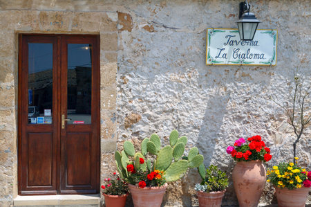 Marzamemi, Italy - May 14, 2004: Sicily island, an old tavern in the village centerのeditorial素材