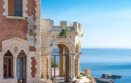 Portopalo, Italy - June 7, 2012: Sicily island, voew of  the Tafuri castle on the seaのeditorial素材