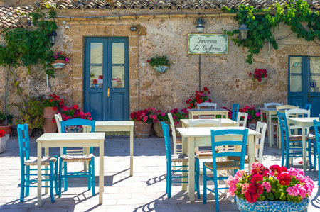 Marzamemi, Italy - June 7, 2012: Sicily island,  an old tavern in the main square of the villageのeditorial素材