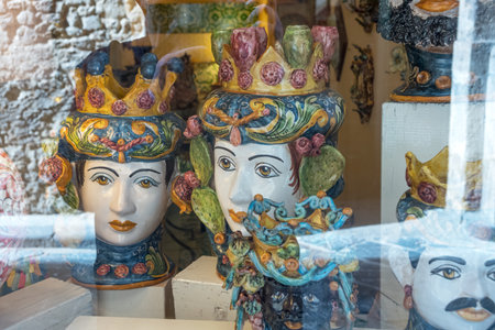 Caltagirone, Italy - February 17, 2018: Sicily island, exhibition of the  typical ceramics worhs in a shop window of the old townのeditorial素材