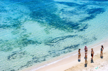 Siracusa, Italy - June 6, 2012:  Tourists on the beach the Punta Castelluccio. areaのeditorial素材