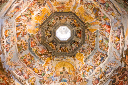 Florence, Italy - October 15, 2009: The Giorgio Vasari's frescoes of the inside cupola of St. Maria Novella Cathedralのeditorial素材