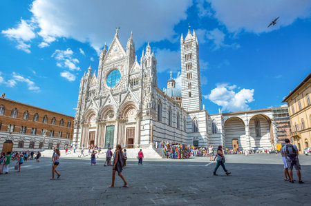 Siena, Italy - August 24, 2012: Local people and tourists in the Cathedral squareのeditorial素材