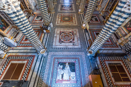 Siena, Italy - August 24, 2012: The famous inlays of colored marbles of the Cathedral's  floorのeditorial素材