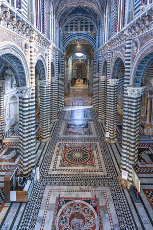 Siena, Italy - August 24, 2012: The famous inlays of colored marbles of the Cathedral's  floorのeditorial素材