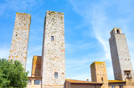San Giminiano, Italy, the famous medieval towers of the old town, seen from Delle Erbe squareのeditorial素材