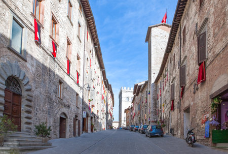 Gubbio, Italy - May 18, 2009: The houses of Dei Consoli street with the Dei Consoli palace in the backgroundのeditorial素材