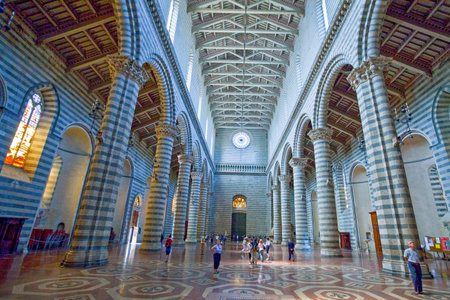 Orvieto, Italy - May 19,2009: Visirors in the nave of the Cathedralのeditorial素材