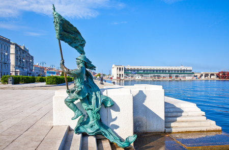 Trieste, Italy - August 8, 2010: Riva Caduti Per l'Italia seafront, a monument of a soldier of the first world warのeditorial素材