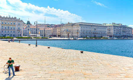 Trieste, Italy - August 10, 2010: The city center seen from the  Caduti Per l'Italia seafrontのeditorial素材