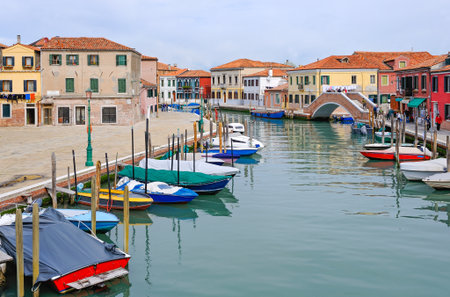 Italy, lagoon of Venice, Murano , traditional houses and boat on the St.Donato canal.のeditorial素材