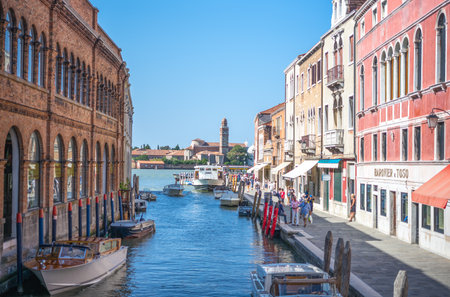 Murano, Italy - April 25, 2008:  Houses, shops and boats in the Fondamente Dei Vetrai canalのeditorial素材