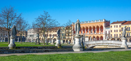 Padua, Italy - March 21, 2013: The statues along the canal in Prato Della Valle squareのeditorial素材