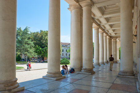 Vicenza, Italy - May 9, 2011: People under he portico of  the Chiericati Palace by the architect Andrea Palladioのeditorial素材