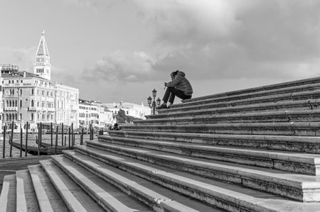 Venice, Italy - December 26, 2014:  A solitary man on the staircase of S.Maria Della Salute churchのeditorial素材