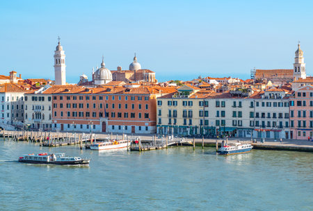 Venice, Italy - july 9, 2017: Panoramic view of Degli Schiavoni lagoon bank with ferry in the foregroundのeditorial素材