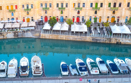 Valletta, Malta - September 13, 2017: The anciet architectures of the Great Harbor with boats mooredのeditorial素材
