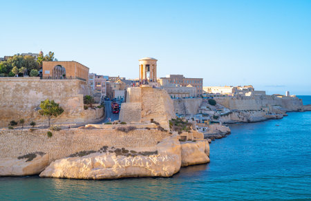 Valletta, Malta - September 13, 2017: View from the sea of the Siege bell monument, a World War II Memorial site in the Upper Barakka gardensのeditorial素材