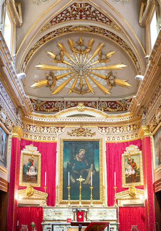 Marsaxlokk, Malta - February 6, 2017: Paintings over the altar of the Our lady churchのeditorial素材
