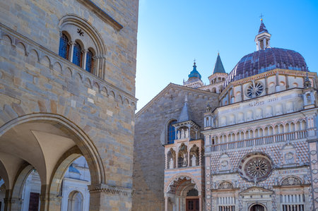 The S. Maria Maggiore basilica with the Colleoni  and the Della Ragione palace in the foreground left, Bergamo, Italyの写真素材