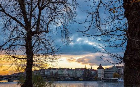 Prague, Czech Republic, view of the city on the Moldava river at the sunsetの写真素材