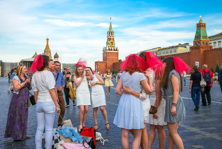 Moscow, Russia - June 13, 2015: Red Square, a group of girls joyful while photographing,のeditorial素材