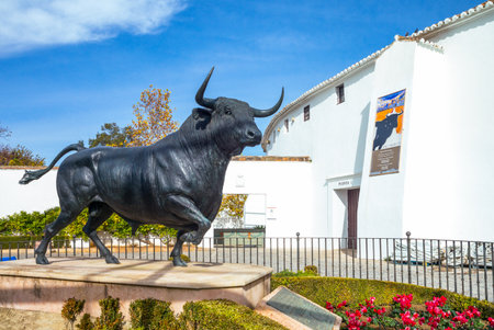 Ronda,  Spain - December 11, 2014: A bull monument in front of Plaza de Toros (Bullring)のeditorial素材