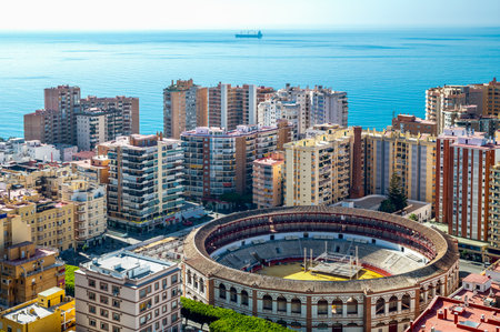 Malaga, Spain - August 28, 2014: View over the city with bullring from the Gibralfaro castleのeditorial素材