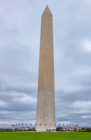 USA, Washington, the Memorial Monument with American flags at the baseのeditorial素材