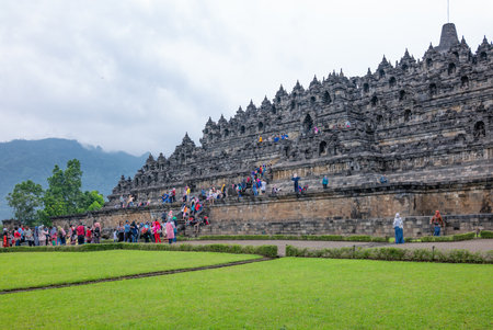 Java, Indonesia - March 26,2017: Visitors in front of the Borobudur buddish templeのeditorial素材