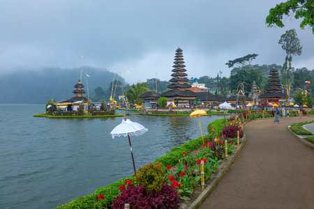 Bali, Indonesia - March 24, 2017:  The ancient pagodas of the Ulun Danu temple on  the Beratan lake riversideのeditorial素材