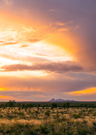 Uluru Kata Tjuta, Australia - October 13, 2014:  Cloudy sunset on the the Kata Tjuta  mountain areのeditorial素材