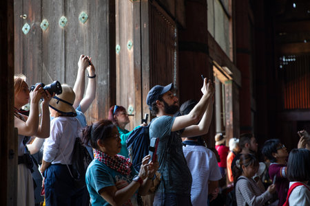 Nara, Japan - April 19, 2018:  Visitors taking picture of the  great Buddah statue in the Todaiji templeのeditorial素材