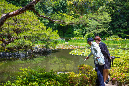 Kyoto, Japan - June 9, 2017: Local visitors in the garden of the Heian Sanctuaryのeditorial素材