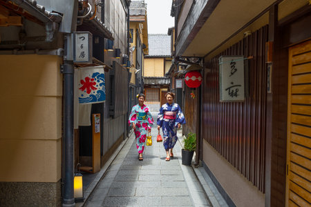 Kyoto, Japan - June 12, 2017: Local ladies in traditional clothing in a alley of the Gion districtのeditorial素材