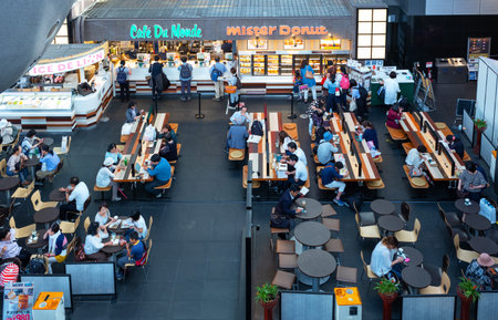 Kyoto, Japan - June 12, 2017: Travellers in a restaurant of the Kyoto train stationのeditorial素材